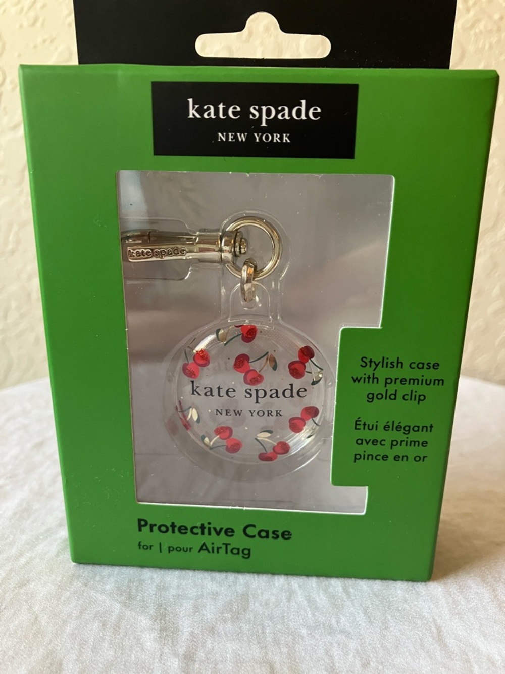 Kate Spade: Cherry Protective Case- AirTag- Gold Tone - Picture 1 of 11
